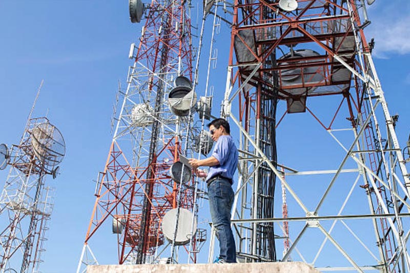 Electrician in a gray uniform