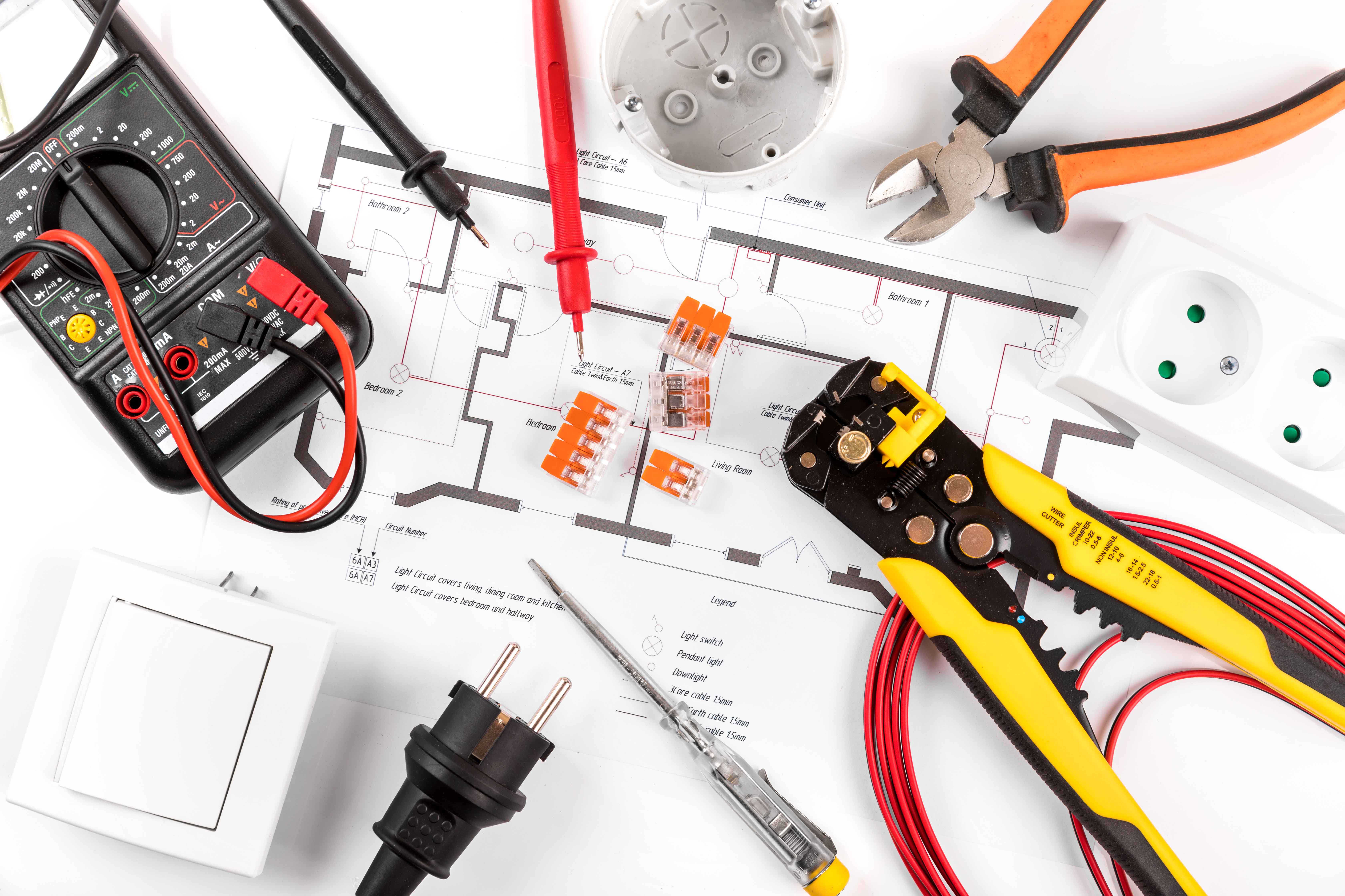 electrical tools and equipment on circuit diagram. top view